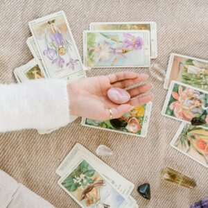 A serene setup of tarot cards and crystals invites insight and introspection.